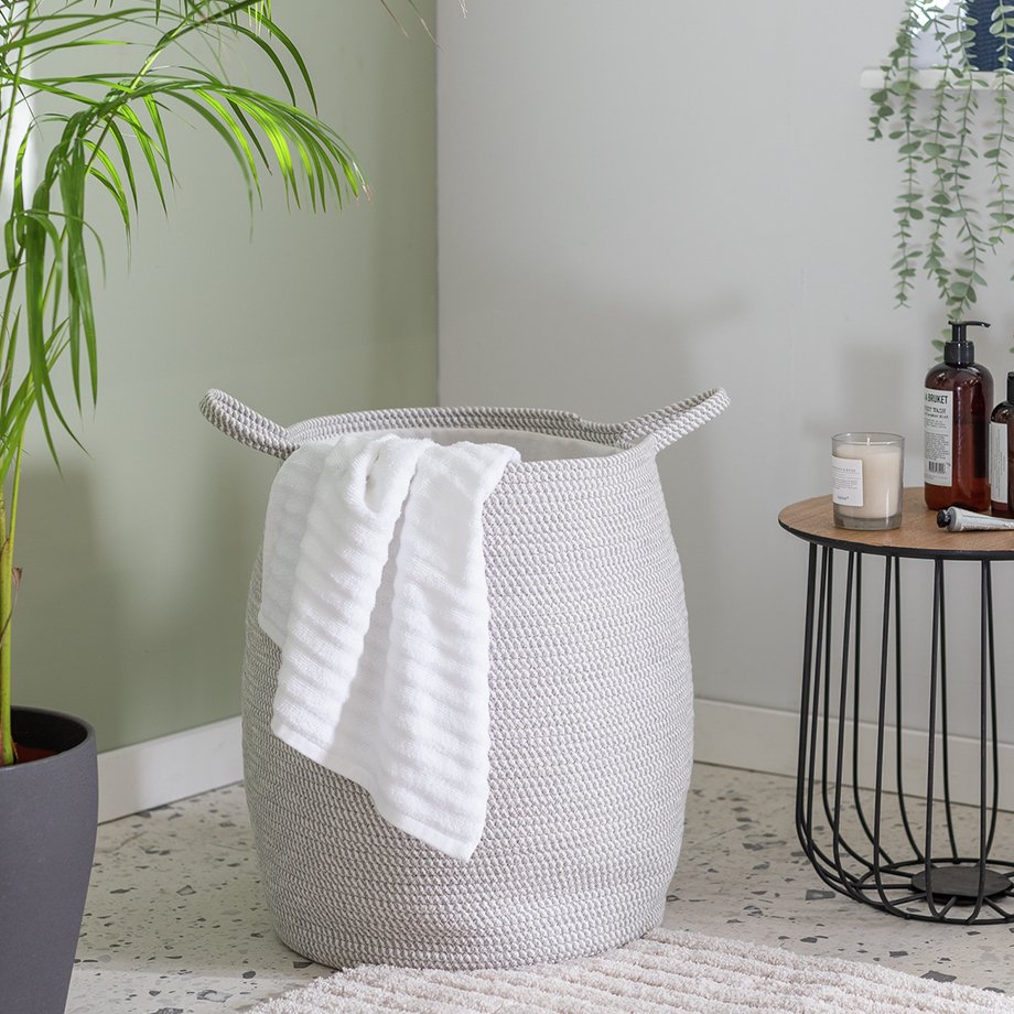 White rope laundry basket.